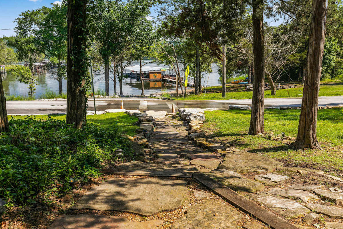 Lakeside fire pit area with resort grounds